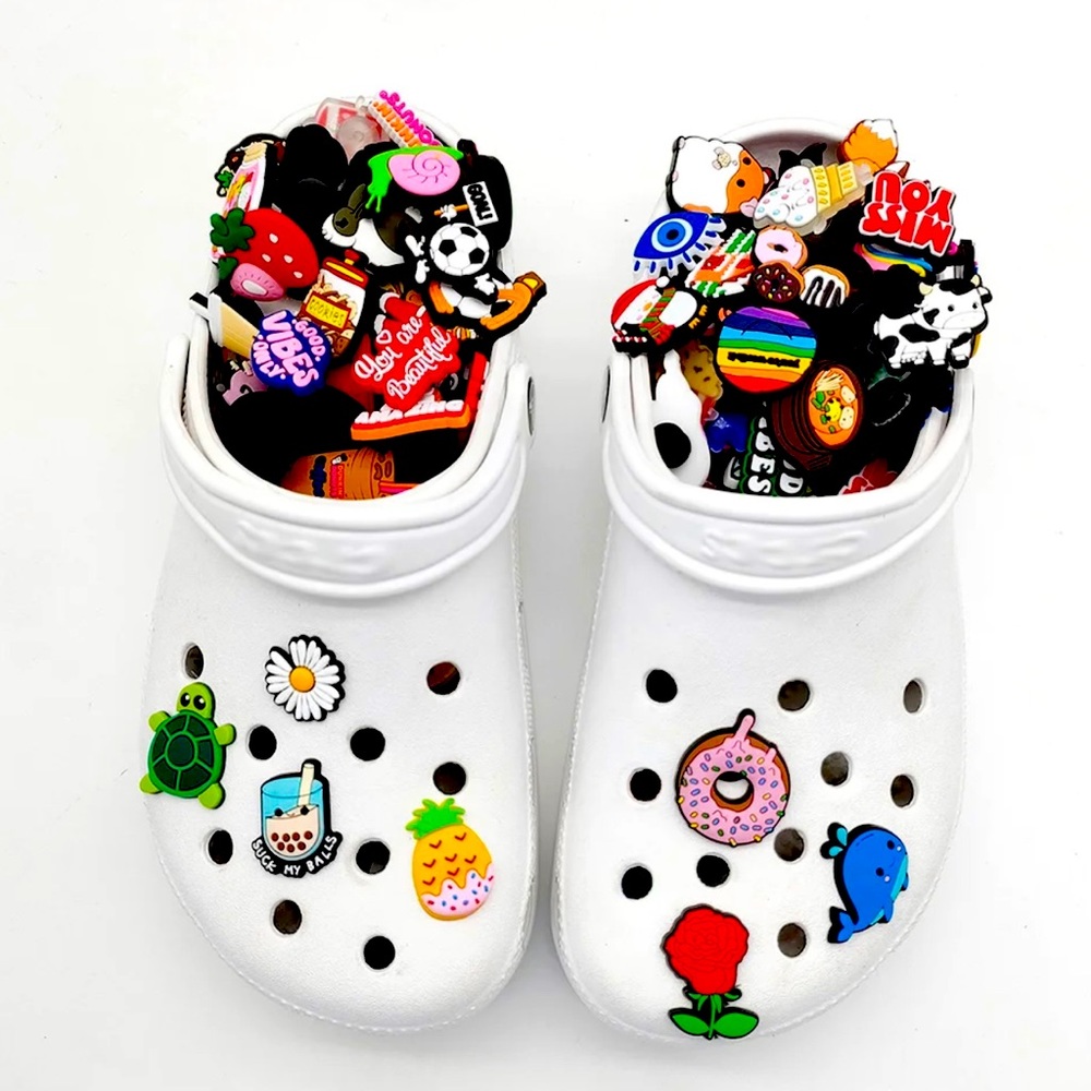 Assorted Brand New Jibbitz 100 Pieces with 28 free Jibbitz